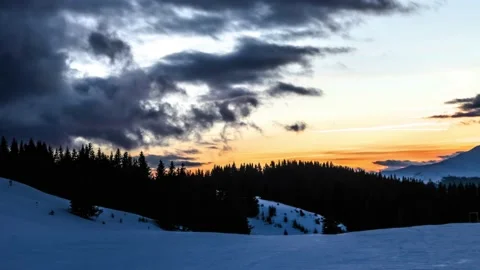 Winter time lapse at sunset in mountains environment Stock Footage 235728020