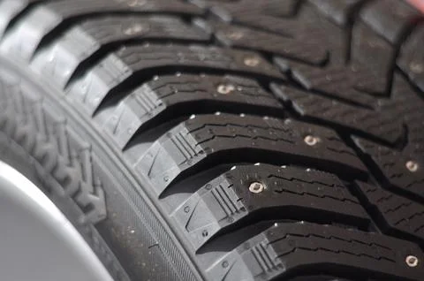 Winter tire close up Stock Photos