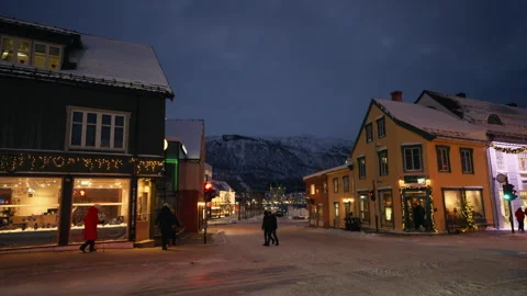 Winter Town Intersection Beneath Mountain Backdrop Stock Footage 340952301