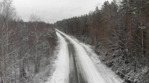 Winter track through the forest and trees covered with snow. Panoramic image 動画素材 129485883