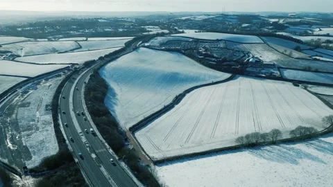 Winter Traffic on Road Snow Covered Fields Stock Footage 227368105