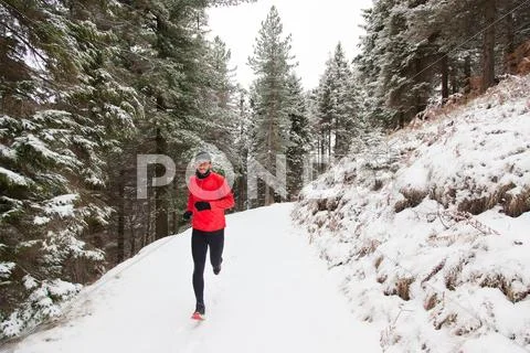 Winter trail running Stock Photos