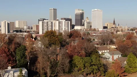 Winter treetops framing the Tulsa Oklahoma skyline Stock Footage 121111590