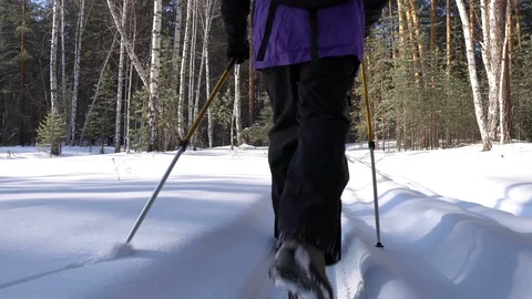 Winter trekking in the forest; man walking on snowdrifts Stock Footage 124212266