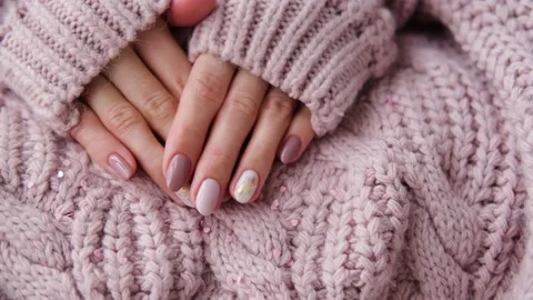 Winter trend, polish beige nails with gel polish, shellac. Stock Footage 170257161