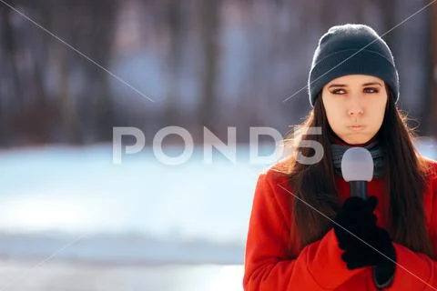 Winter TV Reporter Broadcasting Outdoors in the Snow Stock Photos