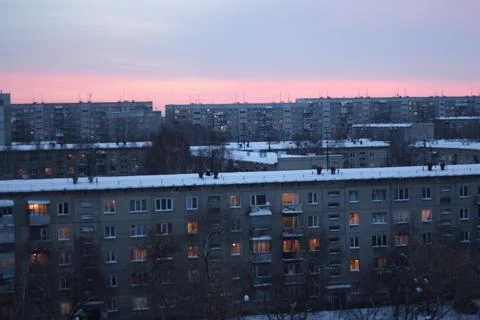 Winter twilight over typical panel residential apartment buildings Stock Photos