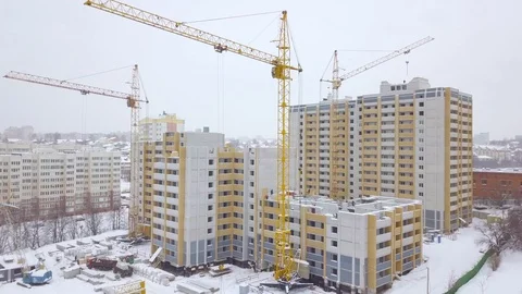 Winter view of a building under construction, aerial shot Stock Footage 102491759