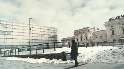 Winter view of city square surrounded by old and modern buildings. Stock Footage 149193047