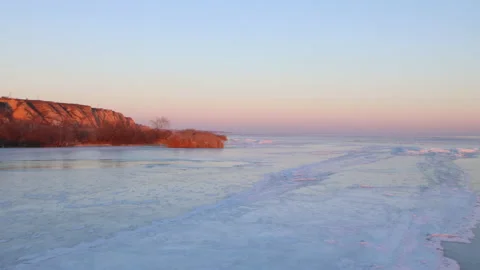 Winter view of clay mountains and hills. The water is covered with ice. Ukraine 스톡 동영상 156712973