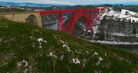Winter view from drone of Garabit Viaduct, railway arch bridge in France 스톡 동영상 264980445