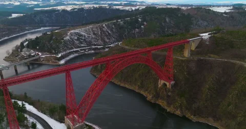 Winter view from drone of Garabit Viaduct, railway arch bridge in France 스톡 동영상 265072048