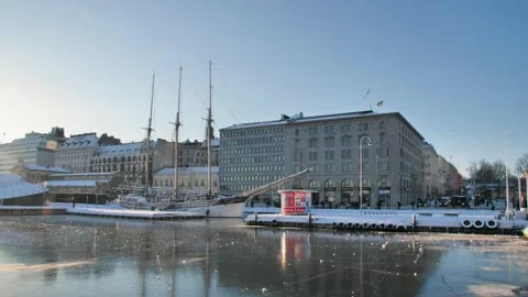 A winter view of Helsinki's port with a docked sailing ship under clear skies Stockbeeldmateriaal 286133142