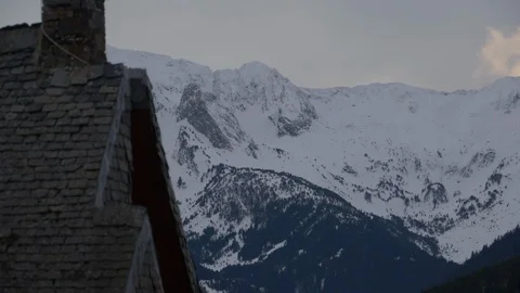 Winter view of house and mountains covered in snow, in Baqueira, Spain Stock Footage 112435154