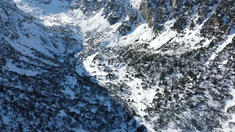 Winter view of Malyovitsa River valley, Rila Mountain, Bulgaria Stock Footage 145394111