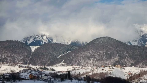 Winter view of Piatra Craiului Mountains from Pestera village in the morning. Stock Footage 79554553