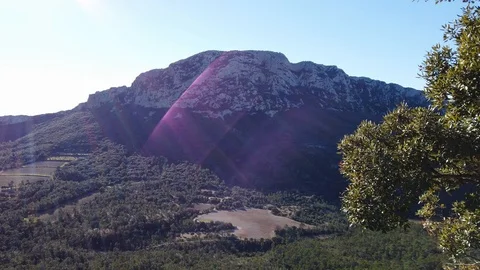 Winter view of Pic Saint Loup, north face, Occitanie, Chateau de Vivioures Stock Footage 102372105