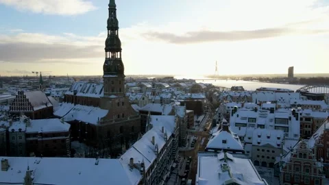 Winter View of Riga with St. Peter's Church and Daugava River Stock Footage 296512662