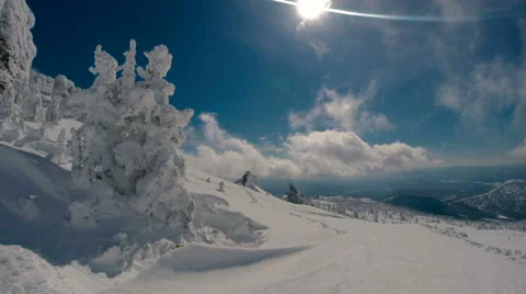 Winter view of the rocks from flying snow and sky in the frame Stock Footage 67832458