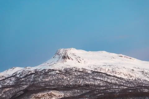 Winter view of a snow covered mountain near Malangen Fjord in Troms, Northe.. Stock Photos