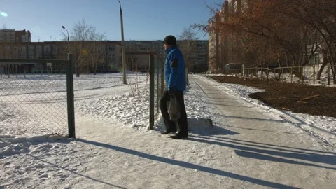 Winter. Walking man. Stockbeeldmateriaal 71972746