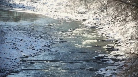 Winter water rapids on the river - a place for water tourism. Stock Footage 72198123