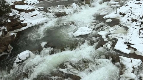 Winter water rapids on the river - a place for water tourism. Stock Footage 72198159