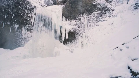 Winter Waterfall following subject or POV Stock Footage 71240139