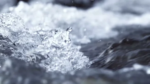 Winter waterfall river close up in slow motion. Crystal water in the mountains. Stock Footage 100704065