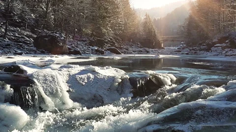 Winter Waterfall in Slow Motion with Sunshine Stock Footage 59955442