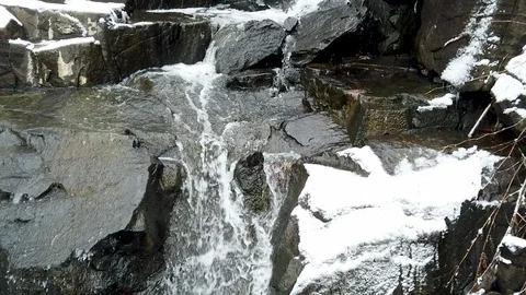 Winter Waterfall Tilt Down Slow Motion Stock Footage 101403580