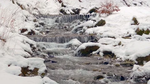 Winter waterfalls in the mountains Stock Footage 59864149