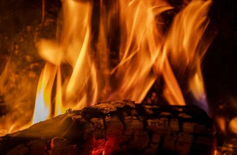 In winter, while it snows outside and the polar cold rages, the wood-burning  Stock Photos