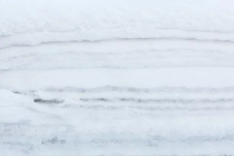 Winter white background of snow layers texture Stock Photos