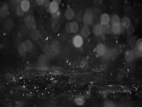 Winter White Motion background lights, snow falling on ice defocused bokeh loop Stock Footage 82431931