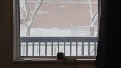 Winter window view house porch with people walking toward school in background Stock Footage 295918378