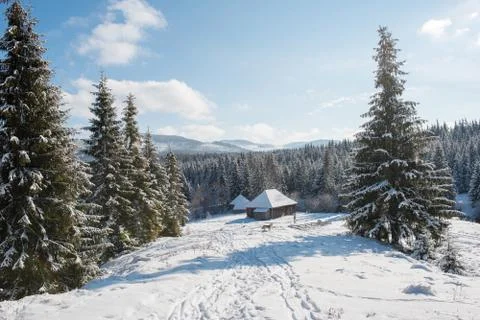 Winter woderland with chalet Stock Photos