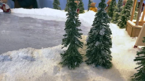 Winter Wonders: Tiny Christmas Trees Creating Big Joy Stock Footage 257699583