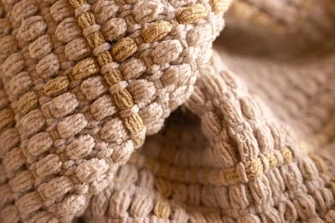 Winter wool blanket woven . Rustic background in light tones. Stock Photos