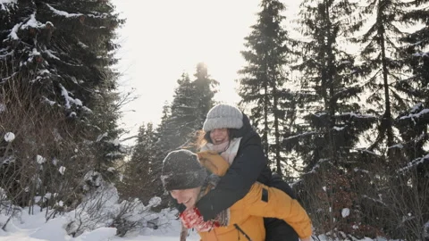 A winter world of fun and fun, where a happy and loving couple enjoys the moment Stock Footage 245387150