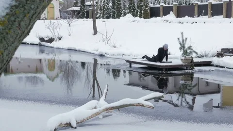 Winter yoga session. Man in black Stock Footage 83916033