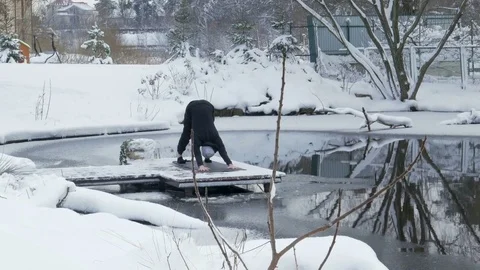 Winter yoga session. Man in black Video stock 83916590
