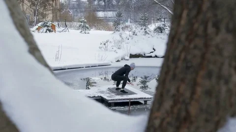 Winter yoga session. Man in black Video stock 83916665