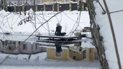 Winter yoga session. Man in black Video stock 83916692