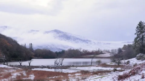 Wintertime at Llyn Cynwch and the Cader Idris mountain range, Mid Wales, UK Stock Footage 293097828