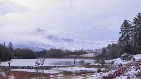 Wintertime at Llyn Cynwch and the Cader Idris mountain range, Mid Wales, UK Video stock 293097936