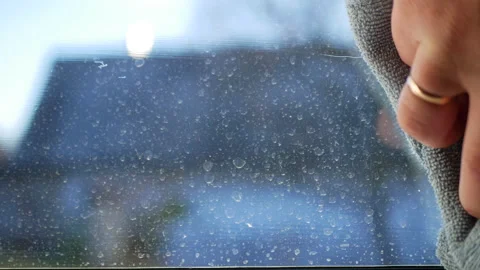 Wipe the condensation on the window Stock Footage 165865145