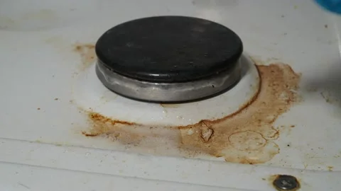 Wipe the dirty plate with a sponge. greasy spots on the white plate Stock Footage 144474729