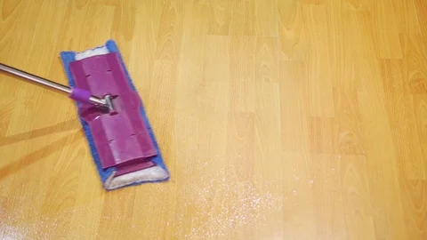 Wipe the laminate with a microfiber mop Stock Footage 83206919