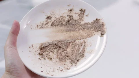 Wipe left over cream on Dish from left to right Slowmotion 1 Video stock 242829625